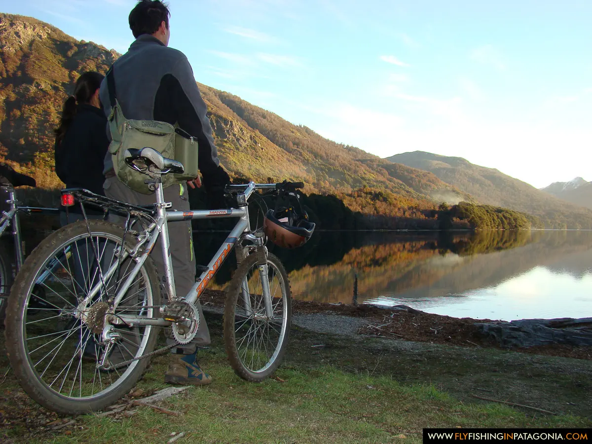 Mountain biking beside a Patagonian lake